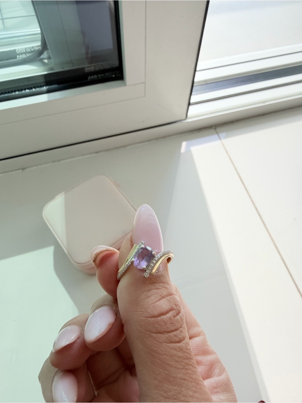 Elegant Gold Ring with Purple Gemstone and Pavé Accents